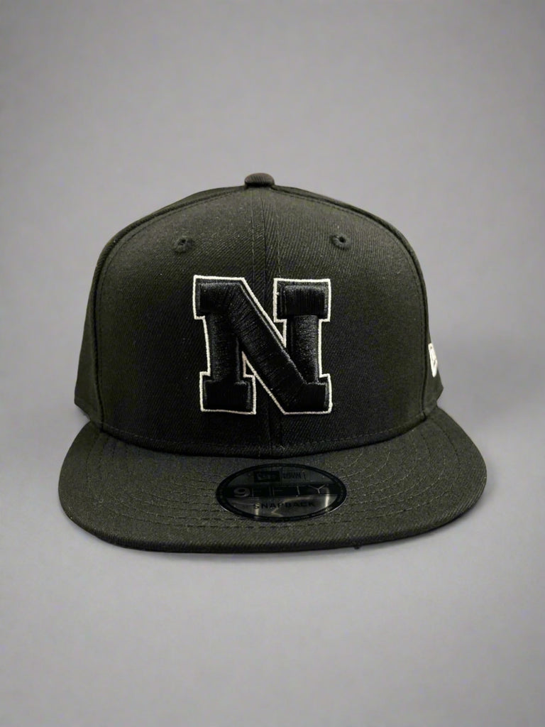 Nebraska Cornhuskers Black/White 9FIFTY Snapback